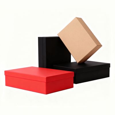 Набор подарочных коробок премиум-класса с оранжевой крышкой и плоским дном в разобранном виде с бумажным пакетом. Особенности: матовое ламинирование, тиснение, печать золотой фольгой.