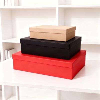 Набор подарочных коробок премиум-класса с оранжевой крышкой и плоским дном в разобранном виде с бумажным пакетом. Особенности: матовое ламинирование, тиснение, печать золотой фольгой.